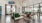 a large room with a glass wall and a mirror