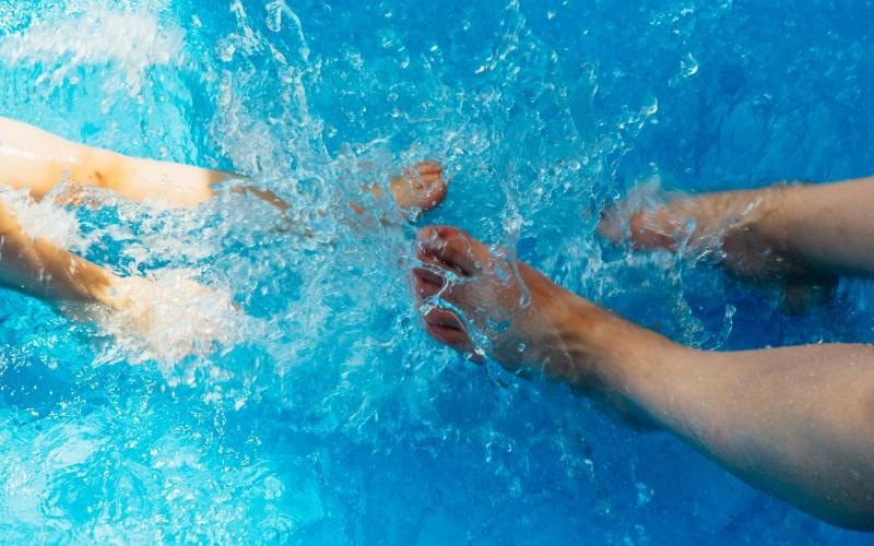 a group of people in a pool