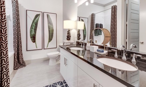 a bathroom with a large mirror